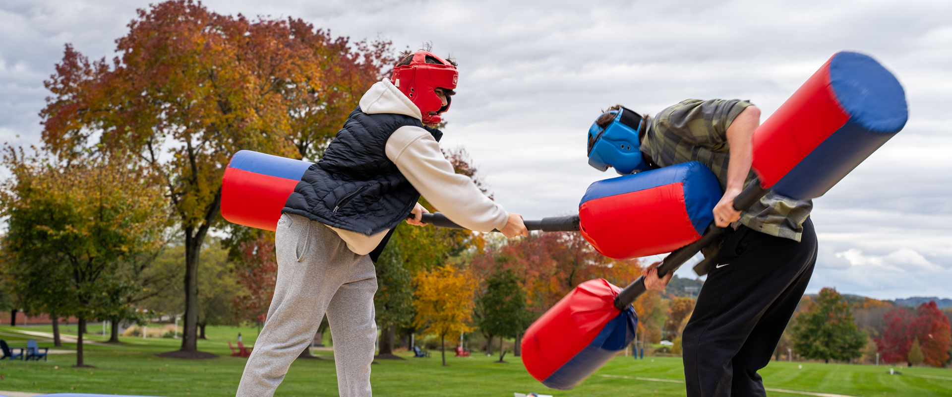 students jousting