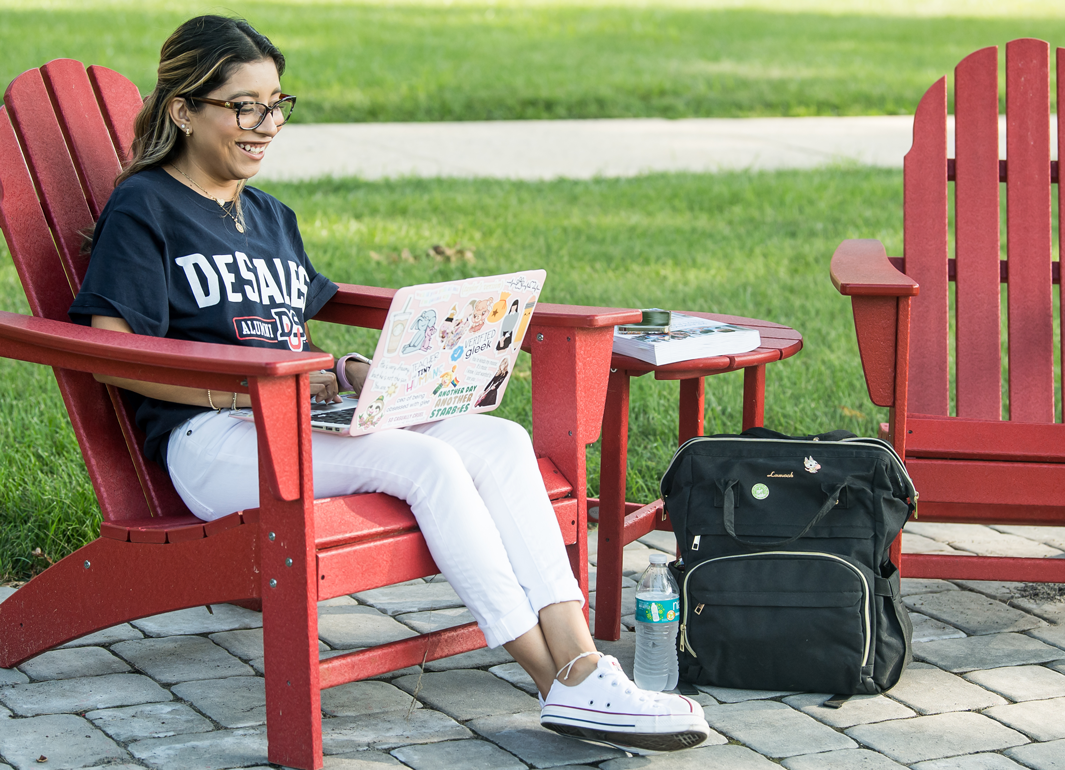 students taking class outdoors