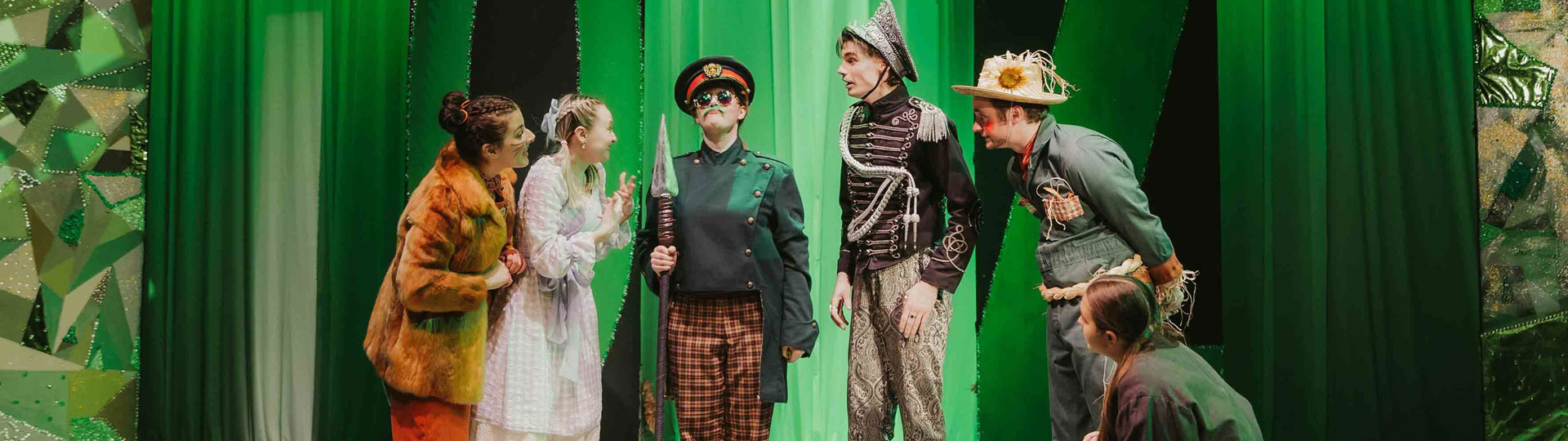 Students acting on a stage